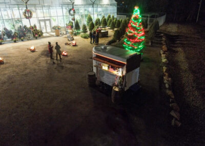 AC Celebrations at Robinson Greenhouse Rockland Drone Shot from above with Christmas Tree behind the mobile bar